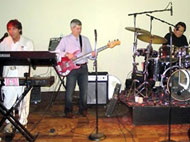 Performing at 40th Beachwood High School Reunion, July 3, 2010. Darryl Berk is on guitar at right. - click to enlarge